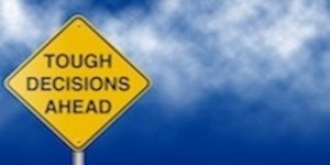 Tough Decisions Ahead Road Sign